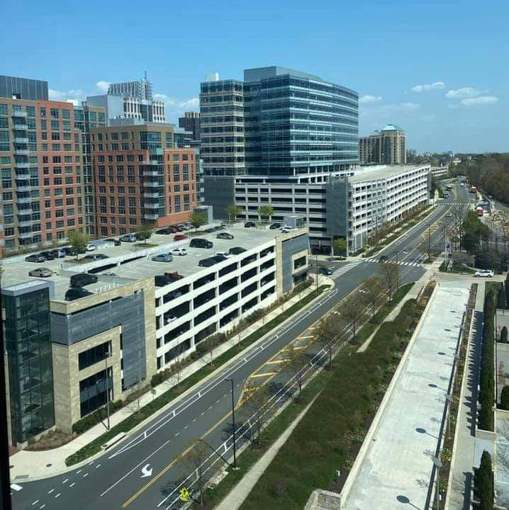 Skyline filled with Reston office buildings and parking structures along Bluemont Way in Reston Town Center
