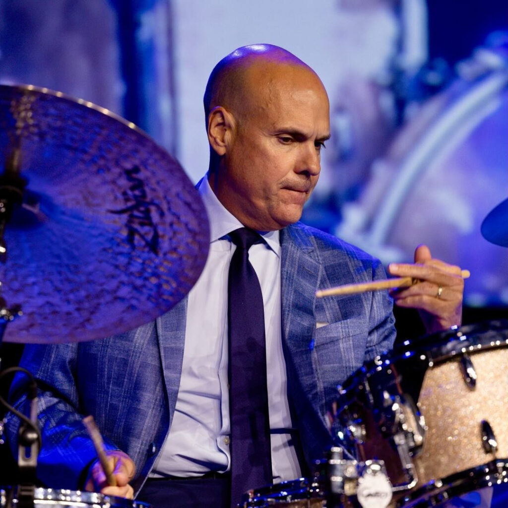 Steve Fidyk playing drums on stage